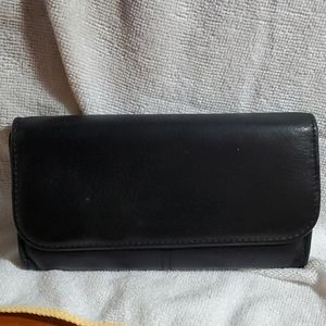 Coach wallet.  Lot of room